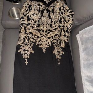 Elegant Black and Gold Embellished Dress